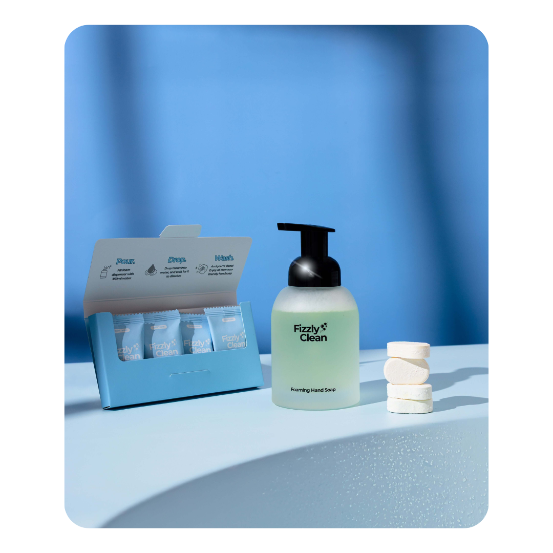 Hand sanitizer bottle with packaging on a blue background